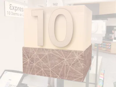 Checkstand light cube from Shop2It Retail's Modern Collection shown in a grocery store décor layout. Checkstand light is acrylic and has a customizable number.