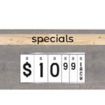 Modern Collection's hanging promotional sign with promo and header inserts on one side of the sign. Inserts sold separately.)