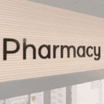 Modern collection wall copy dimensional letters for pharmacy department wayfinding. Aluminum face and finished edges.