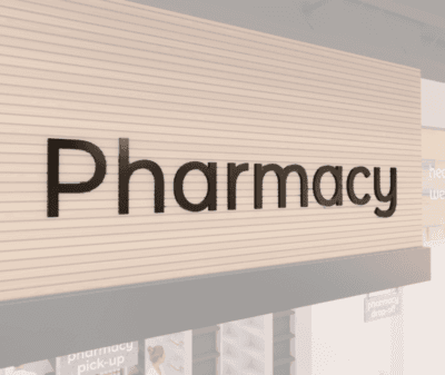 Modern collection wall copy dimensional letters for pharmacy department wayfinding. Aluminum face and finished edges.