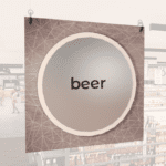 Modern Collection's singled sided large department sign with digitally printed text "beer" centered on a circular overlay