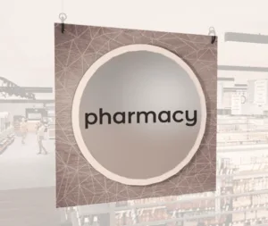 Modern Collection's singled sided large department sign with digitally printed text "pharmacy" centered on a circular overlay
