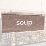 Modern Collection's singled sided small hanging dept sign with digitally printed white dimensional centered text "soup."