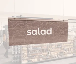 Modern Collection's singled sided small hanging dept sign with digitally printed white dimensional centered text "salad."