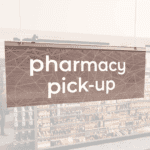 Modern Collection's singled sided small hanging dept sign with digitally printed white dimensional text "pharmacy pick-up."