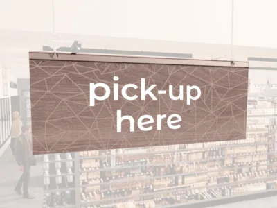 Modern Collection's singled sided small hanging department sign with digitally printed white dimensional text "pick-up here."