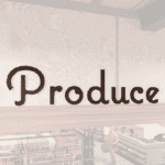Natural Collection's wayfinding department sign wall copy for Produce. Dimensional wood letter with a painted finish.