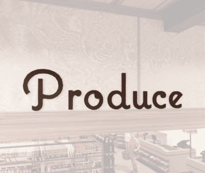 Natural Collection's wayfinding department sign wall copy for Produce. Dimensional wood letter with a painted finish.