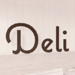 Natural Collection's wayfinding department sign wall copy for Deli or Prepared Food. Wood letters with a painted finish.