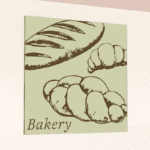 Traditional Collection's wayfinding department sign for the "Bakery," that is digitally printed on vinyl-wrapped wood core.