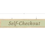 Traditional Collection's self-checkout sign has the same wood grain pattern on both sides it measures 10" tall by 56.5" wide