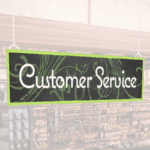 Natural Collection's large 9" tall by 36" wide hanging department sign with text "Customer Service" for department wayfinding.