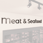 Modern Collection's Meat & Seafood wayfinding large sign wall copy with dimensional wood letters and metal laminate faces.