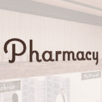 Natural Collection's Pharmacy dept. wayfinding sign large wall copy dimensional letters measuring about 29" tall by 127" wide.