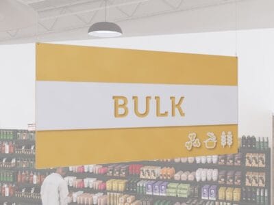 Bulk Foods Department Sign from Shop2It Retail's Iconic collection has text "BULK" cutout to reveal color beneath and dimensional icons.