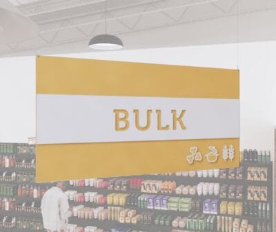 Bulk Foods Department Sign from Shop2It Retail's Iconic collection has text "BULK" cutout to reveal color beneath and dimensional icons.
