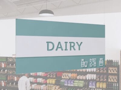 Dairy Department Sign from Shop2It Retail's Iconic Collection has cutout text to reveal color beneath and dimensional icons.