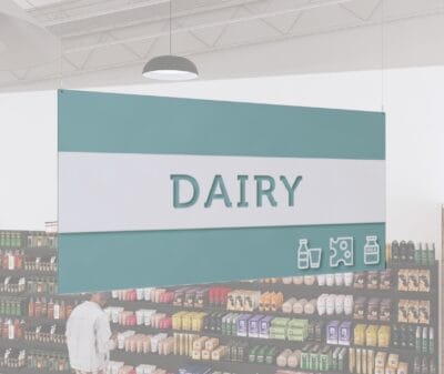 Dairy Department Sign from Shop2It Retail's Iconic Collection has cutout text to reveal color beneath and dimensional icons.