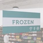 Frozen Department Sign from Shop2It Retail's Iconic Collection has cutout text to reveal color underneath and dimensional icons.