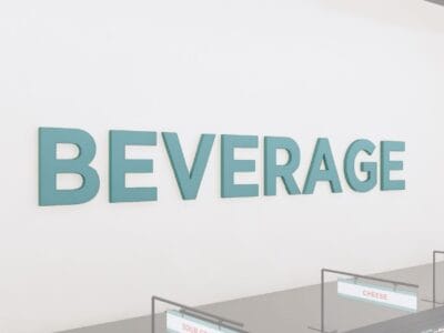 Department sign wall copy for beverage department from the Iconic Collections cheerful color selection.