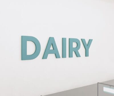 department sign wall copy for the dairy department from the Iconic Collection's Cheerful color selection.
