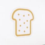 The department graphic panel for the bakery department sign is a slice of bread icon.