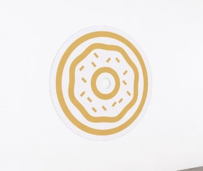 The department graphic panel for the bakery department sign is a single donut icon.