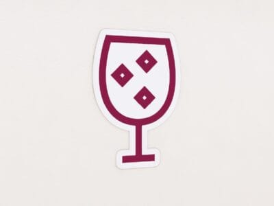 Department graphic panel alcohol department sign is a stemware beverage glass.