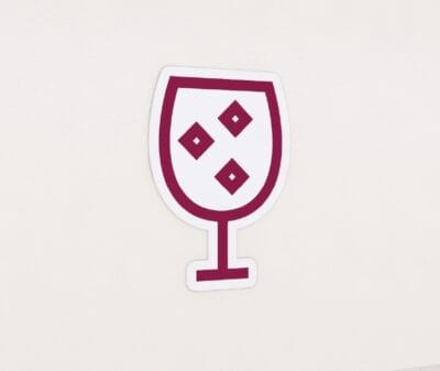Department graphic panel alcohol department sign is a stemware beverage glass.