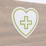 pharmaceutical heart symbol icon graphic panel for pharmacy department wayfinding from the Iconic Collection's Cheerful color selection.