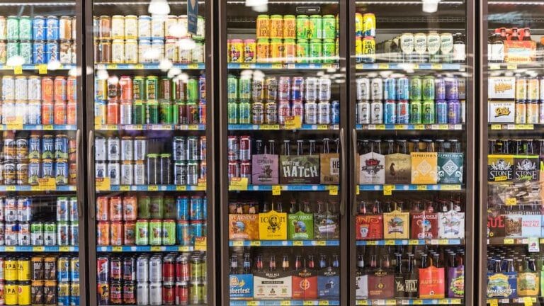 reach-in cooler filled with an assortment of alcoholic products